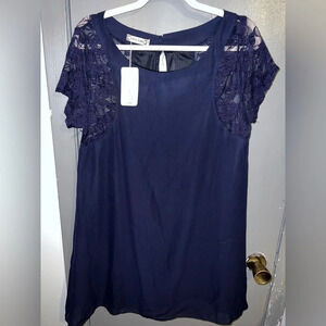 NWT Liva Girl dark Navy dress with lacy sleeves keyhole closure on back.